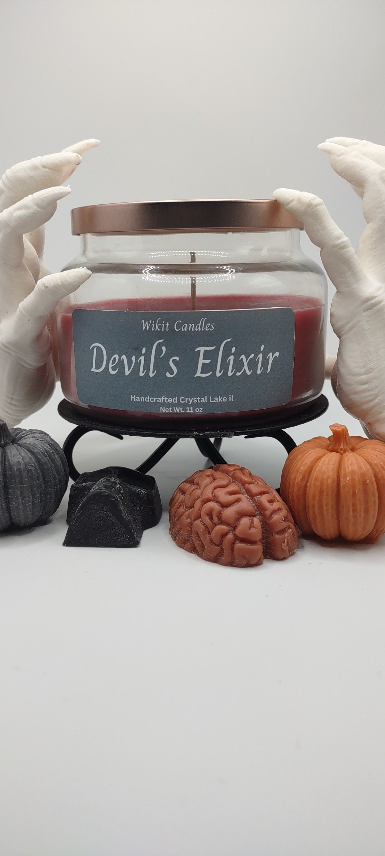 Santal and Coconut scented candle called Devils Elixir Halloween collection home decor 11 oz candle.